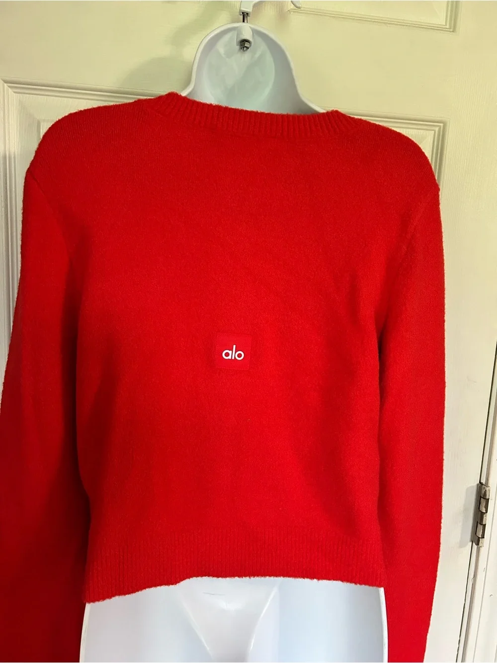 Alo yoga Snuggle Up Sweater Cropped Cardigan in Bright red color